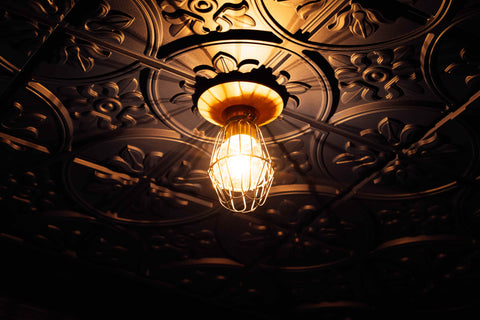 Light bulb hanging from a ceiling