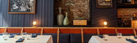 House of McGrath restaurant interior with elegant seating and warm lighting