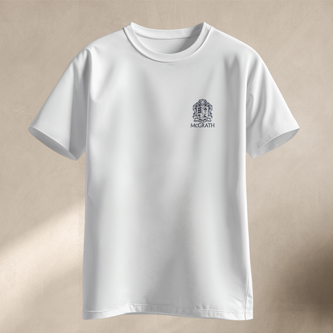 Front view of white short sleeve shirt with McGrath crest logo on chest